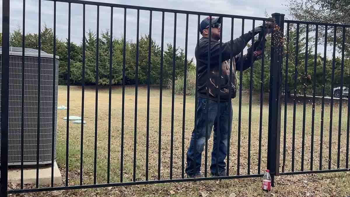 Contractor Repairing Metal Fence | Inspired Ironworks Professional Welder | Wrought Iron Fence Repair Contractor Repairing Metal Fence | Inspired Ironworks Professional Welder | Wrought Iron Fence Repair