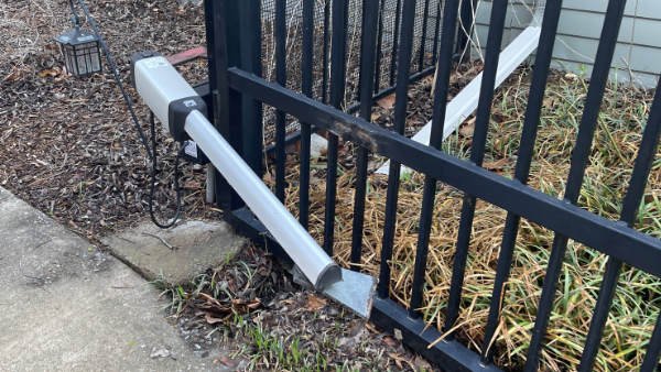broken automatic gate arm | iron gate repair